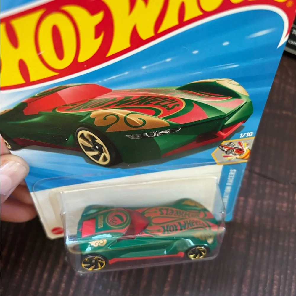 Green Die-Cast Hot Wheels Car with Racing Design
